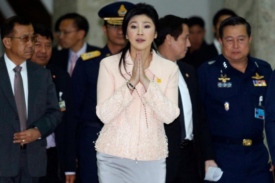 Премьер-министра Таиланда Йинглак Чинават на встрече с журналистами 21 января