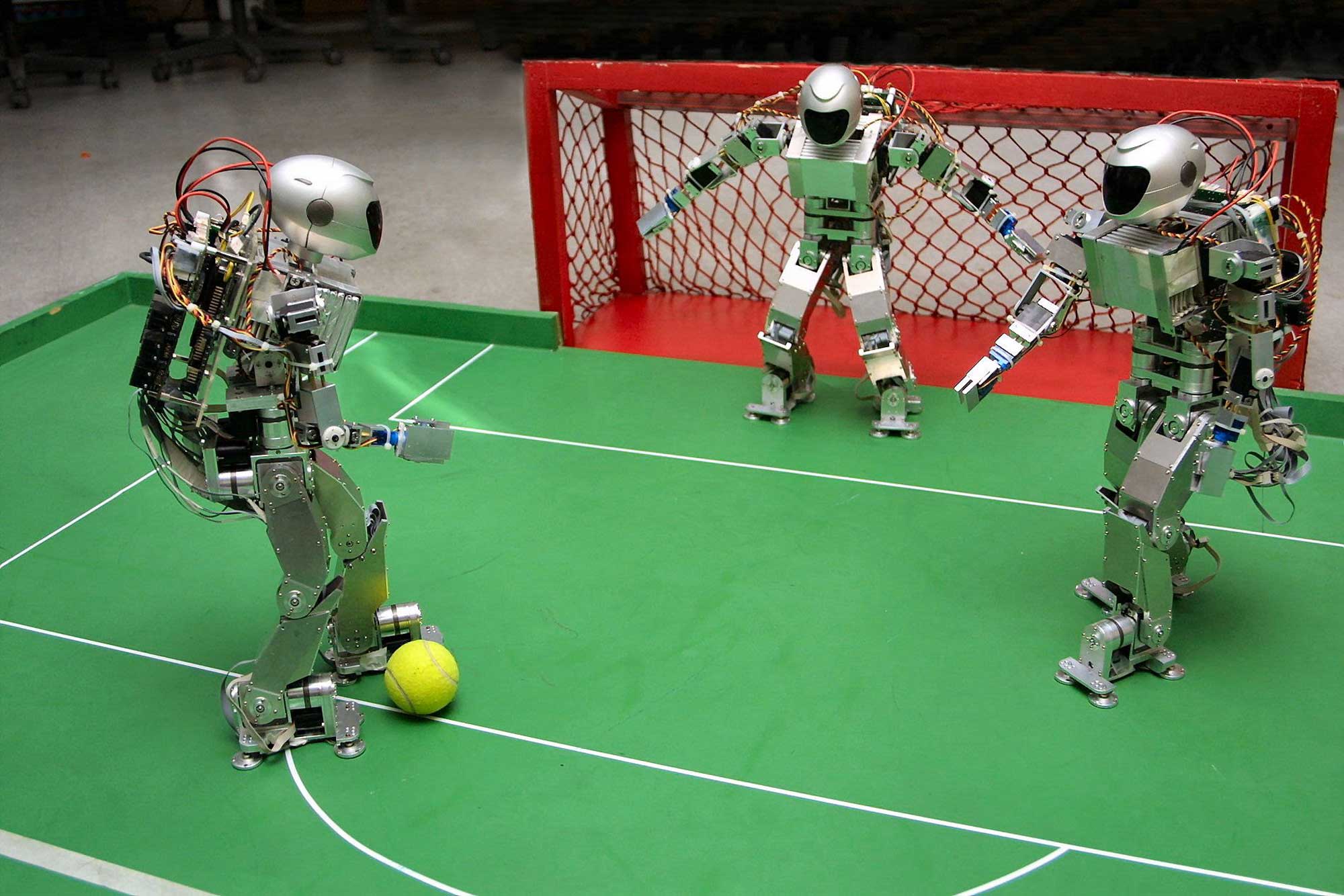 Турнир роботов по футболу. Соревнования роботов. Спортивный робот. Роботы для развлечения. Робот спортсмен.